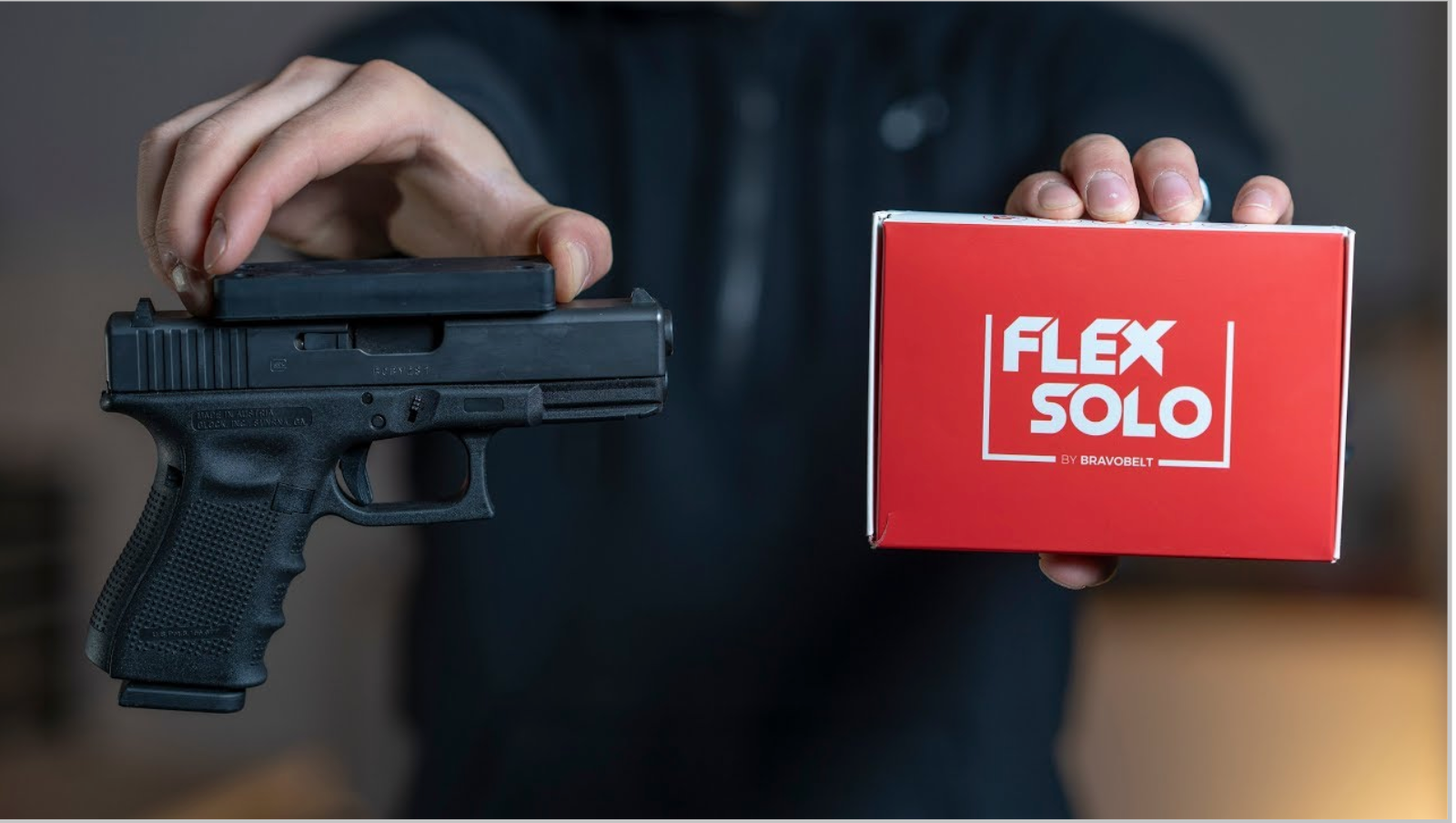 A man holder a FlexSolo Gun Magnet